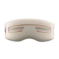 Beige eye massager with perforated vent panels and side indicator port